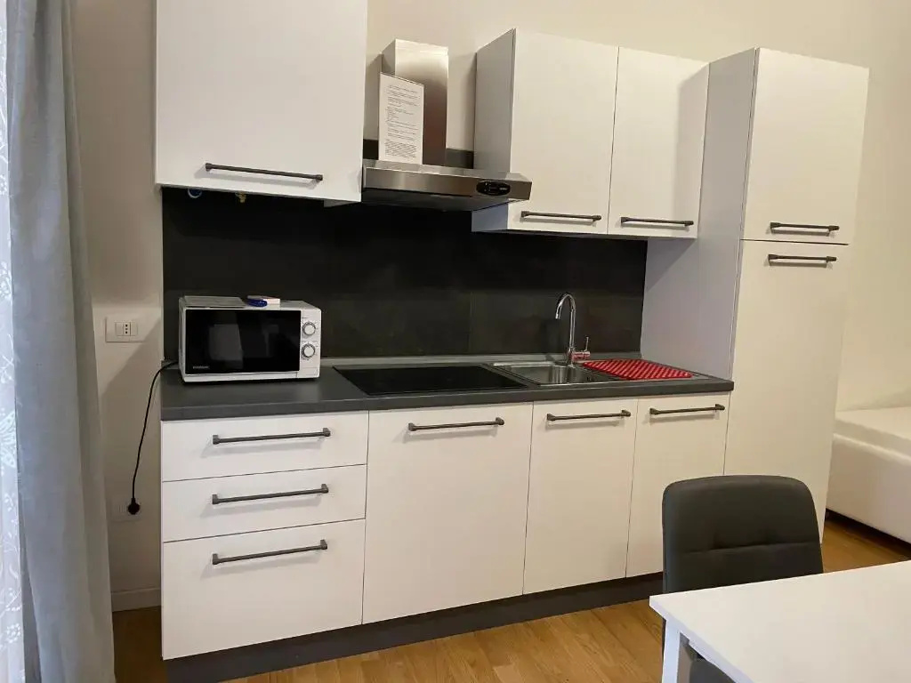 Residence Cavour 63 - Chambres