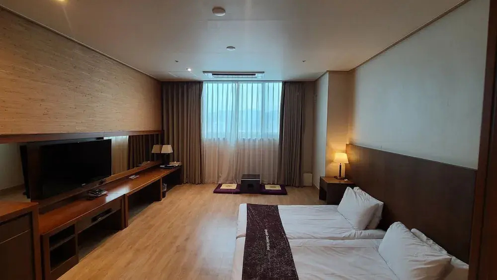 Hyunjin Tourist Hotel - Chambres