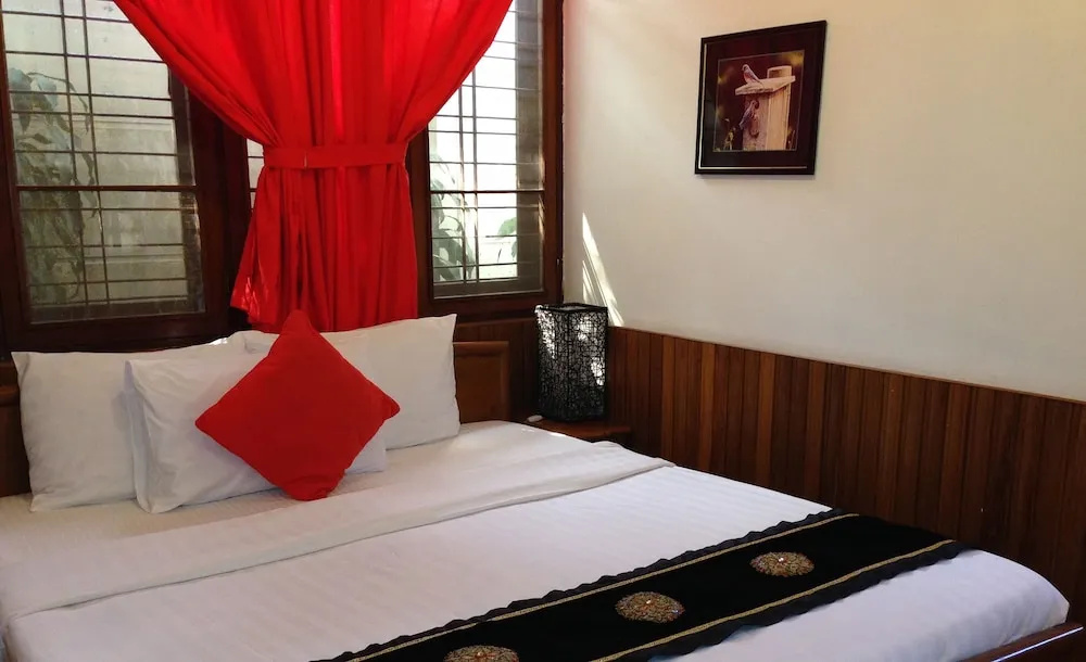 Classique Inn - Chambres