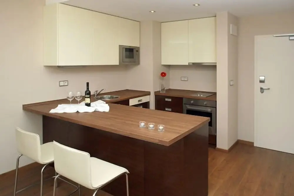 Golden Fish Hotel Apartments - Chambres