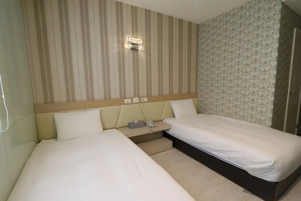 Chao She Hotel - Chambres