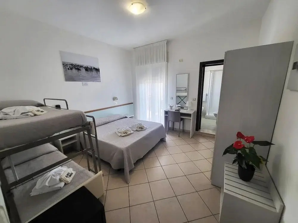 Comfort Quadruple room with balcony and with garden view