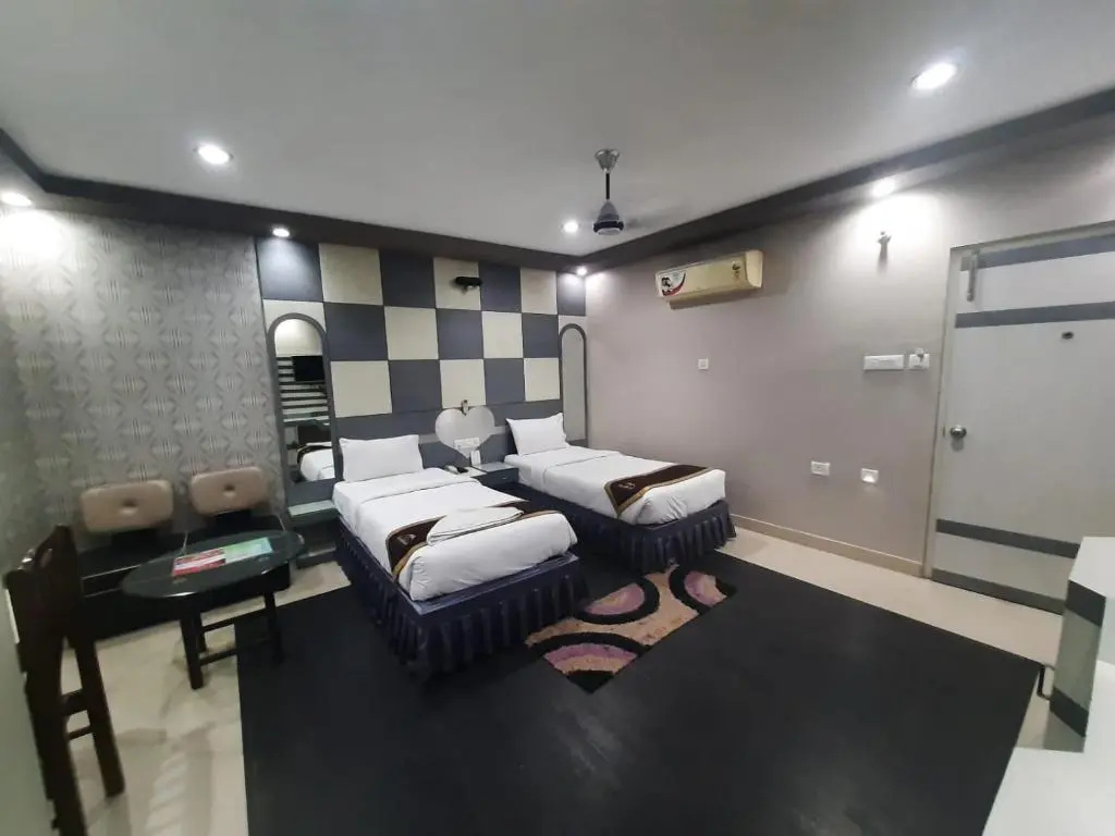 Hotel Corporate Inn - Chambres