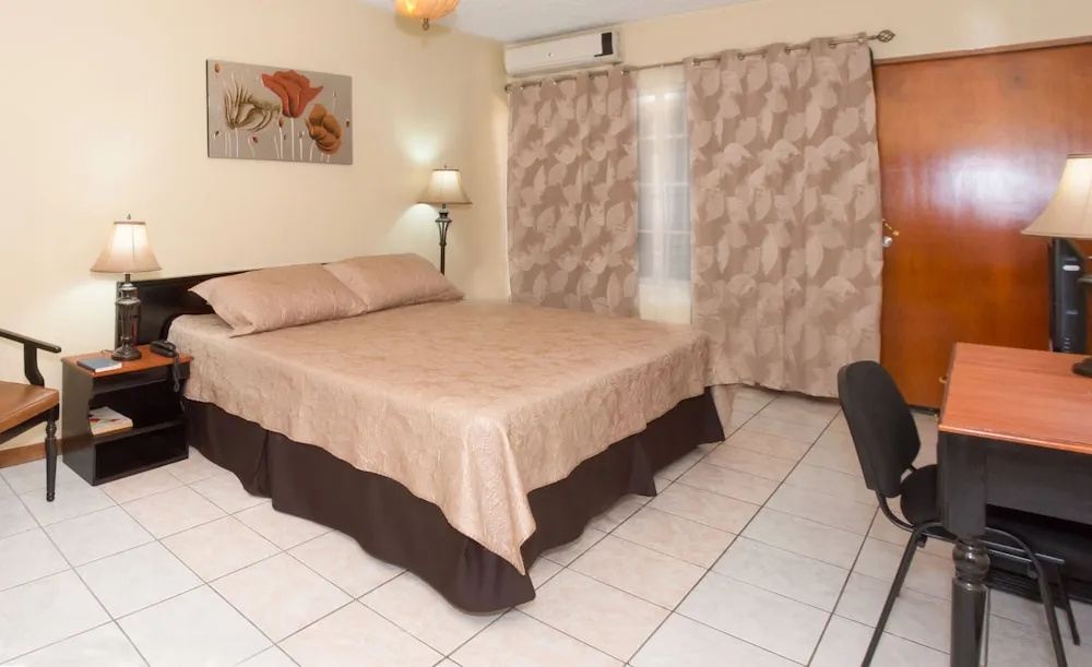 Hotel Tropico Inn - Chambres