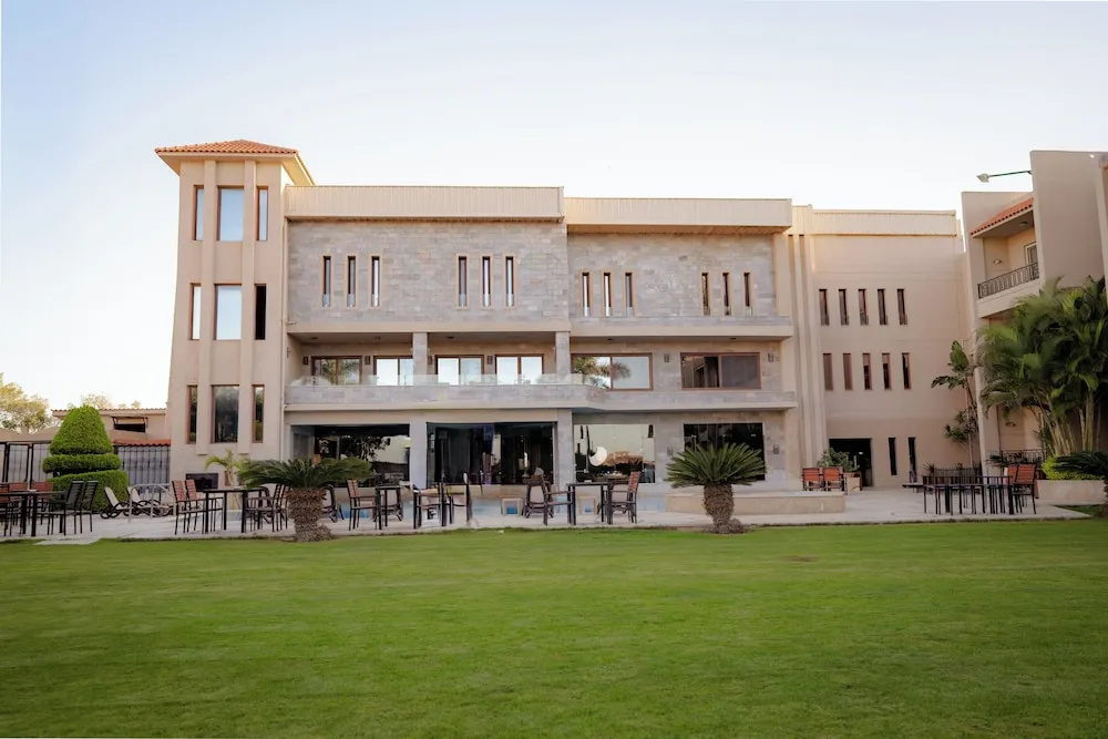 Panacea Suites Hotel - Chambres