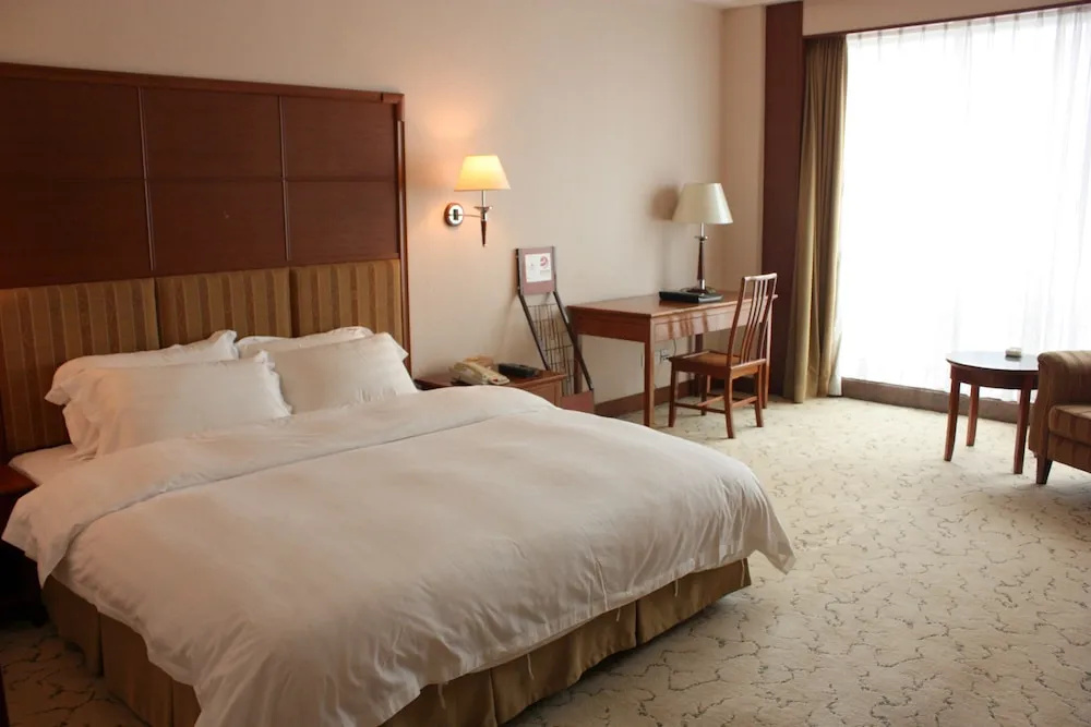 Gladden Hotel Shilong - Chambres