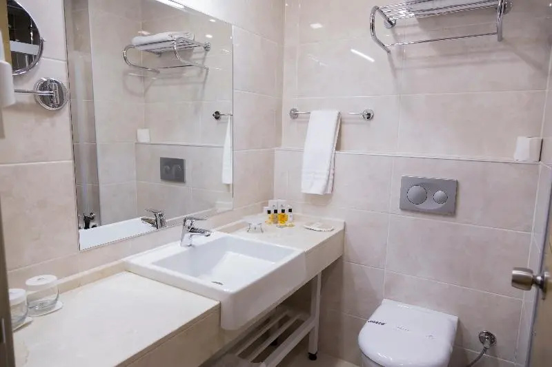 Grand Itimat Hotel - Chambres