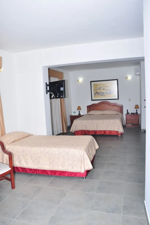 Hotel Laureles 70 - Chambres