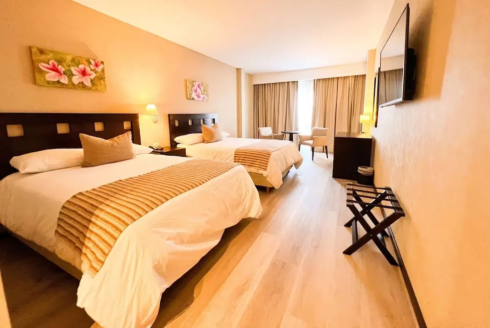 Howard Johnson by Wyndham Funes - Chambres
