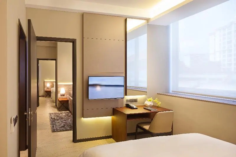 Louis Kienne Serviced Residences - Chambres