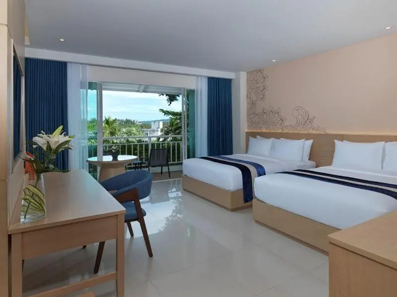 Двухместный номер Grand Deluxe с балконом 2 отдельные кровати в Chanalai Flora Resort, Kata Beach