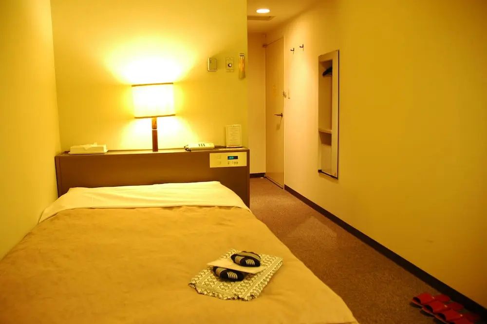 Hotel Heart Inn - Chambres