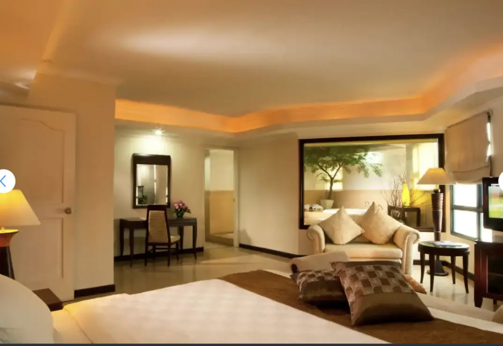 Grand Tropic Suites Hotel - Chambres