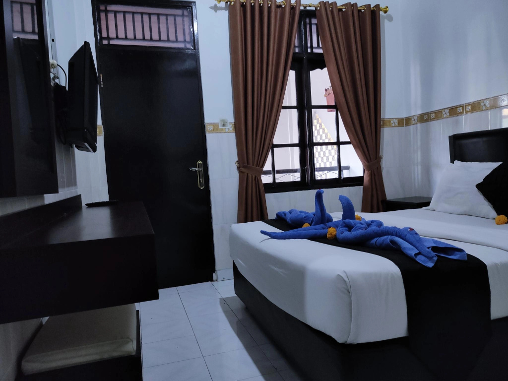 Отель Pondok Denayu Homestay в Куте