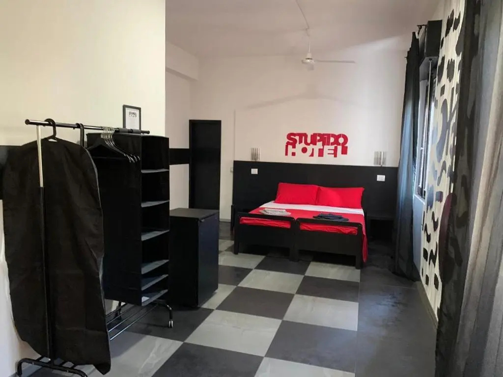 Stupido Hotel - Chambres