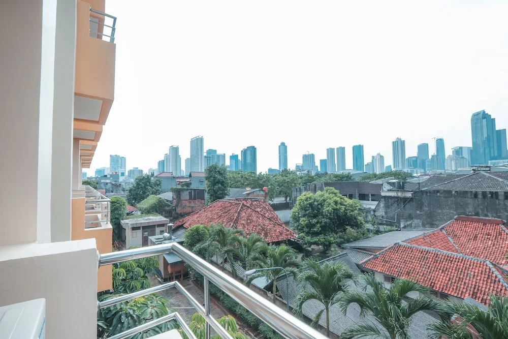 Capital O 203 Prasada Mansion Sudirman - Chambres