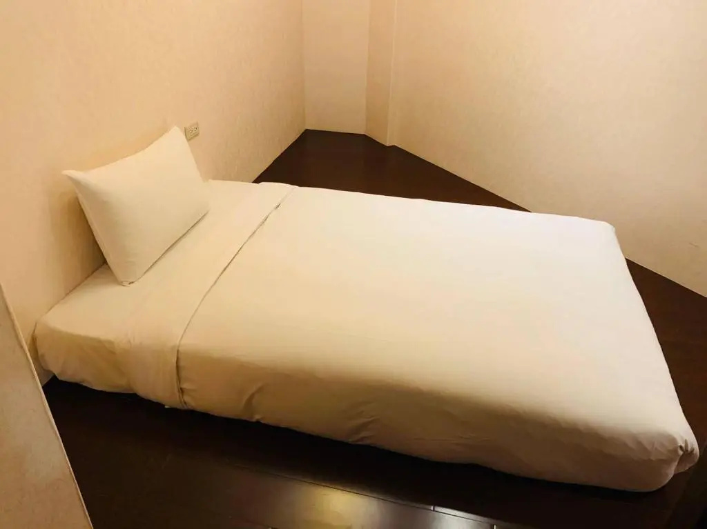 Kai Shen Sinsu Hotel - Chambres