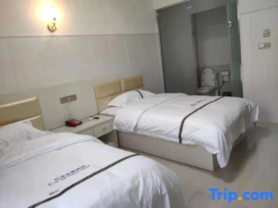 Huayun Hotel - Chambres