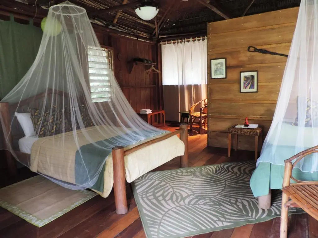 Standard Quadruple room with garden view