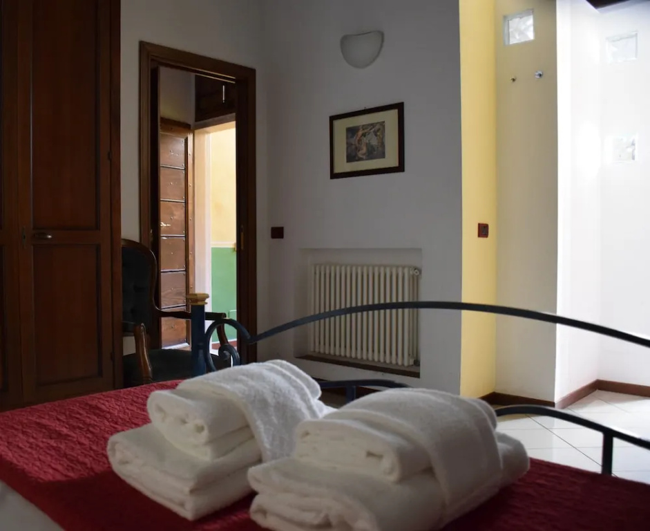 Standard Quadruple room with courtyard view