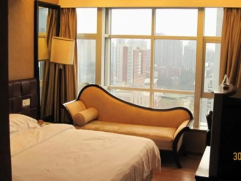Huaweida Hotel - Chambres
