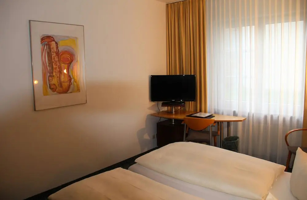 Check Inn Hotel - Chambres