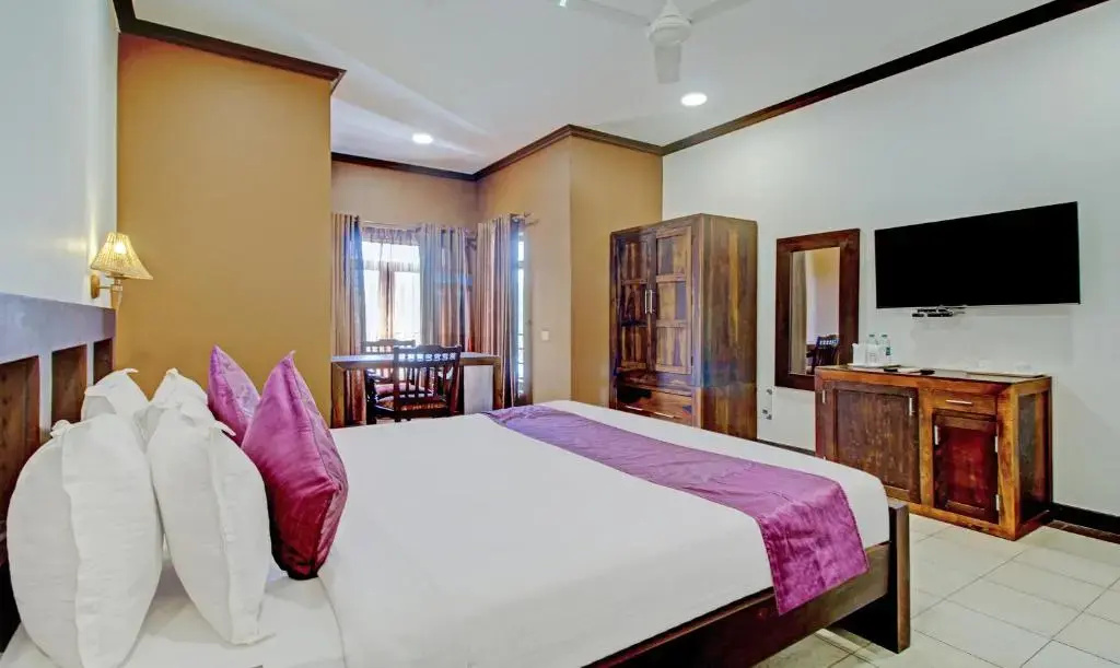 Treebo Premium Travancore Palace Cherthala - Chambres