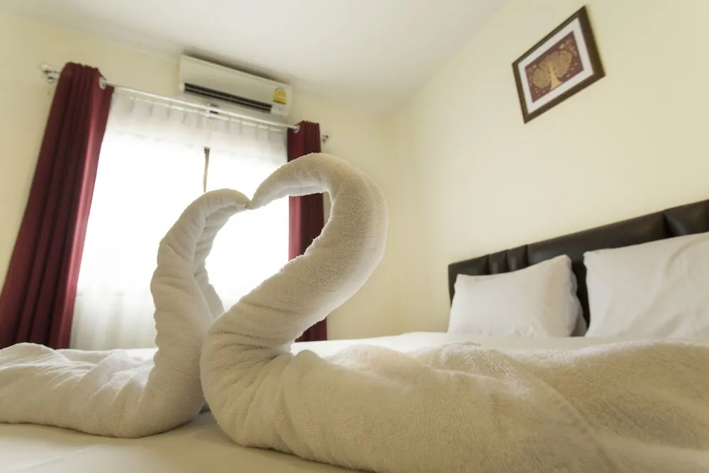Paripas Express Hotel Patong - Chambres
