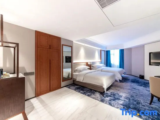 Huayun Hotel - Chambres