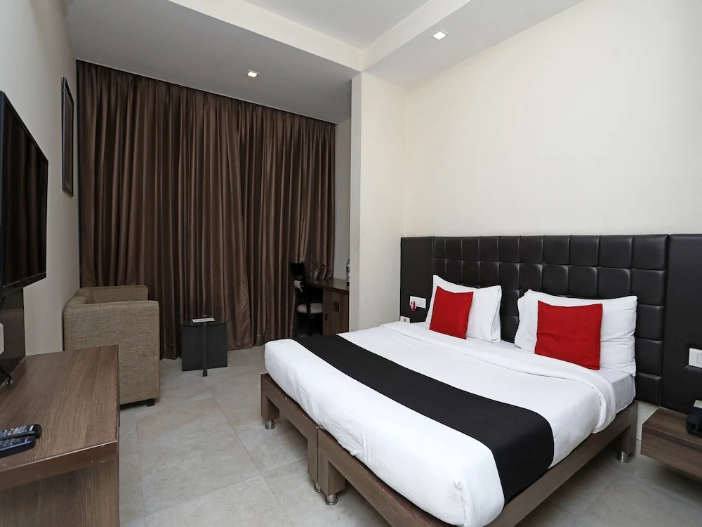 Capital O 3831 Jade Inn - Chambres
