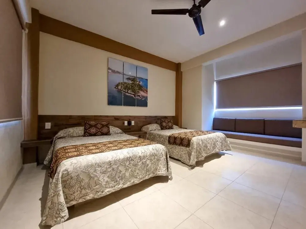 Hotel Casa Ixtapa - Chambres