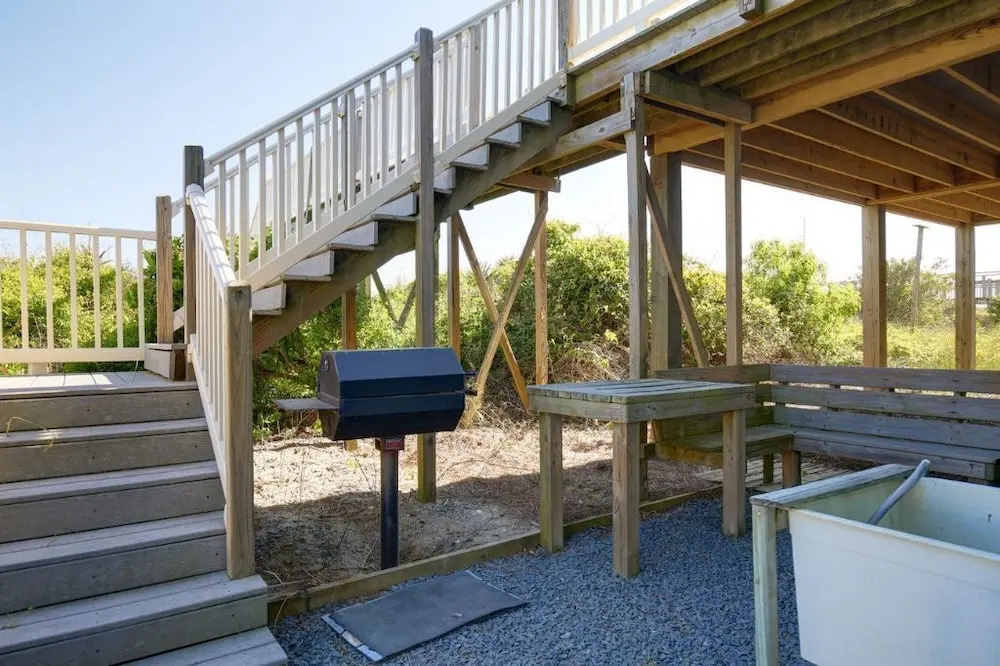 Windchimes 4 Bedroom Home by RedAwning