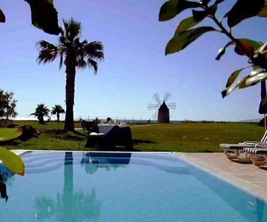 1 Bedroom Executive Basement Suite with partial sea view