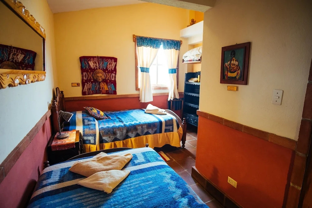 Hotel y Cafe La Casa del Mundo - Chambres