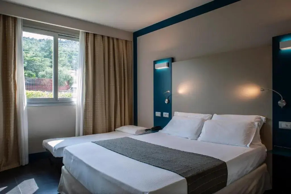 La Meridiana Bleisure Hotel - Chambres