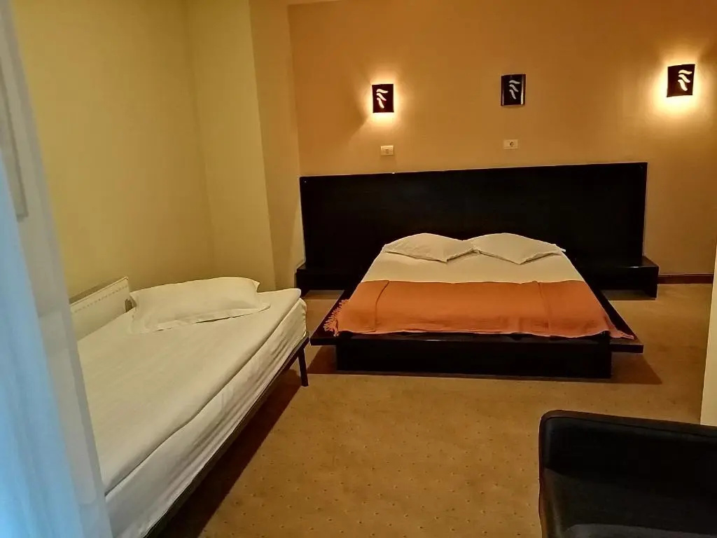 Maxim Hotel - Chambres