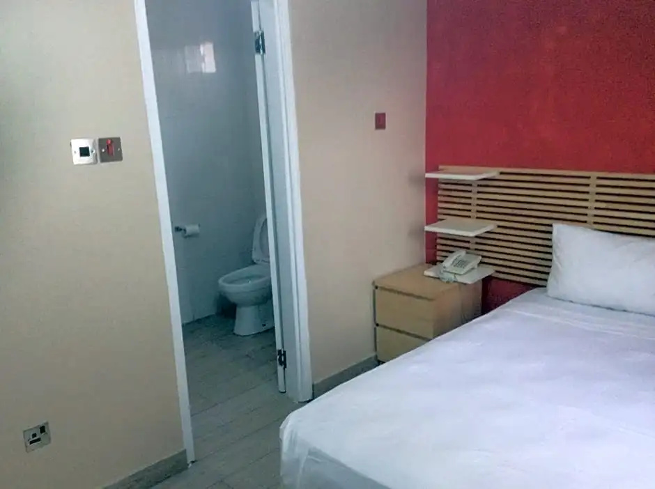 Tropical Enclave Hotel - Chambres