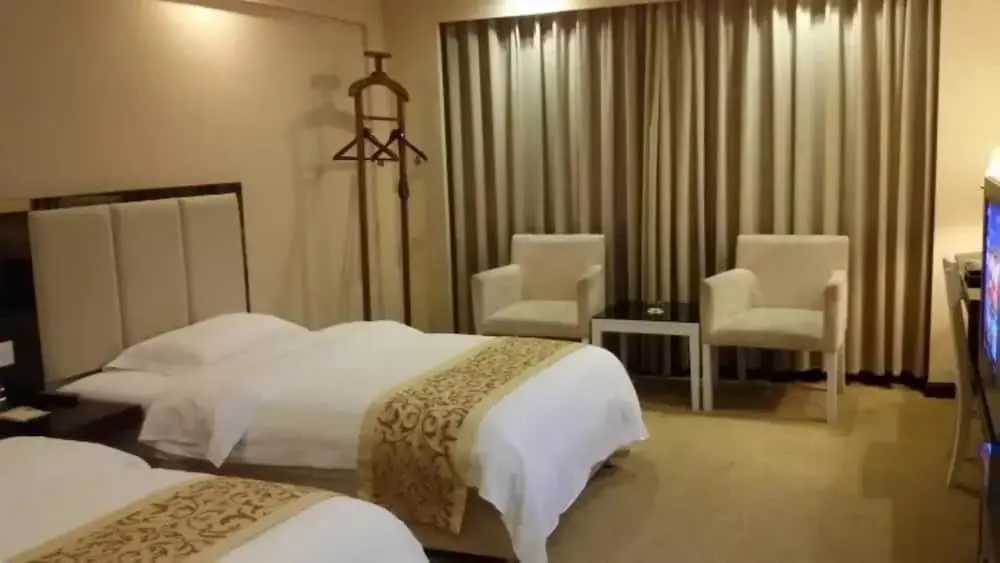 Junyue Hotel - Chambres