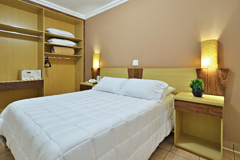 Plaza Inn Flat Araxá - Chambres