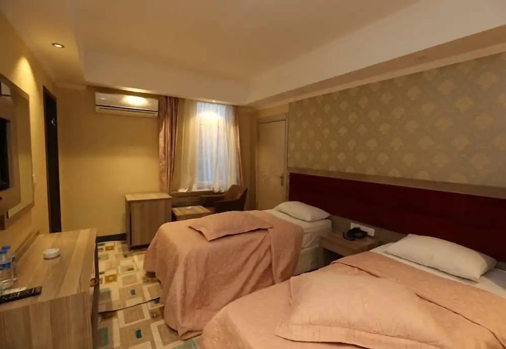 Standard Triple room with sea view