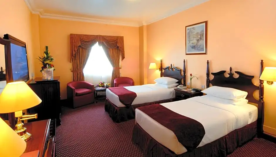 Delmon International Hotel - Chambres