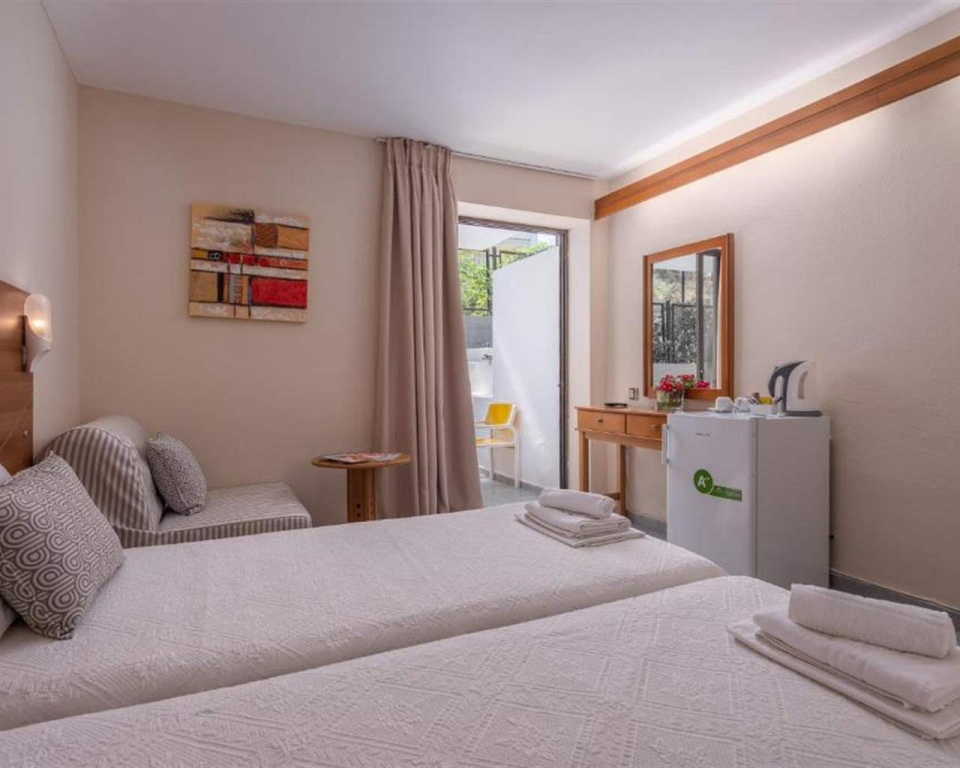 Dionysos Hotel & Suites - Chambres