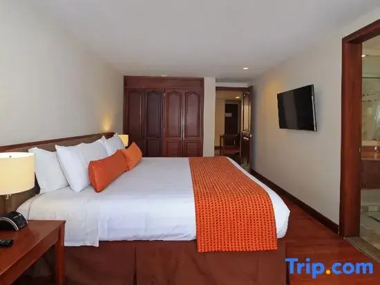 Windsor House Inn By Geh Suites - Chambres