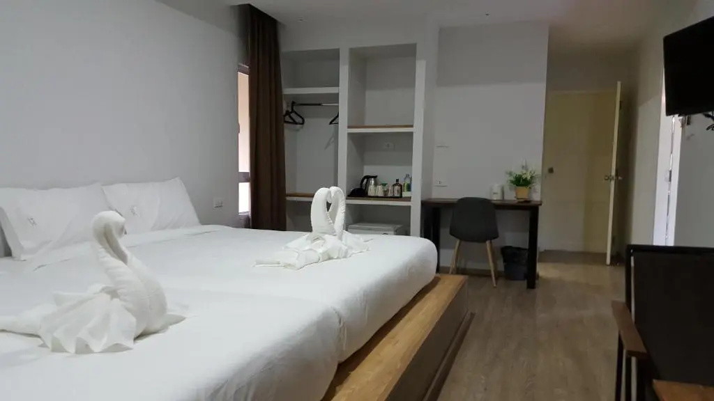 Standard Quadruple room with garden view