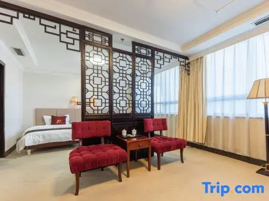 Xinmao Tiancai Hotel - Chambres