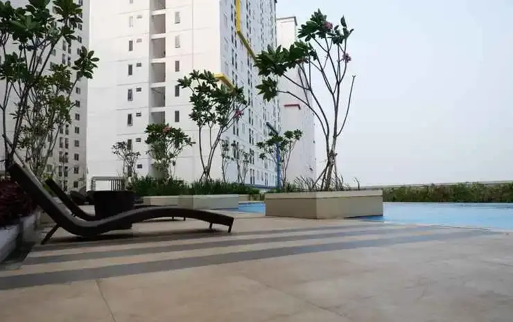 2BR Apartment with Cozy Style at Bassura City By Travelio