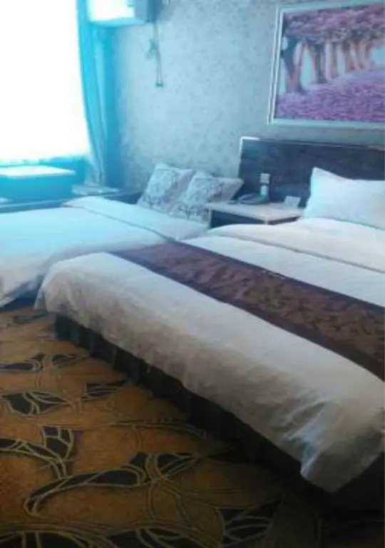 Zhangye Liangmao Hotel - Chambres