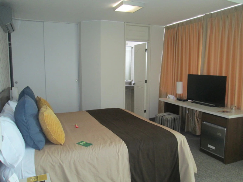 Palmetto Hotel Business La Perla - Chambres