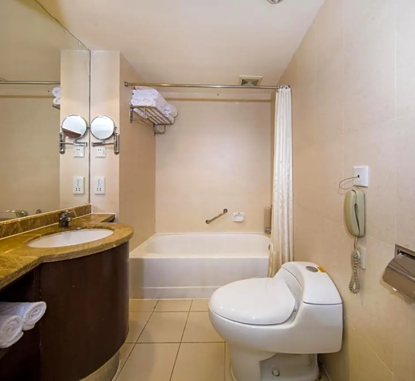 Standard Triple room with garden view