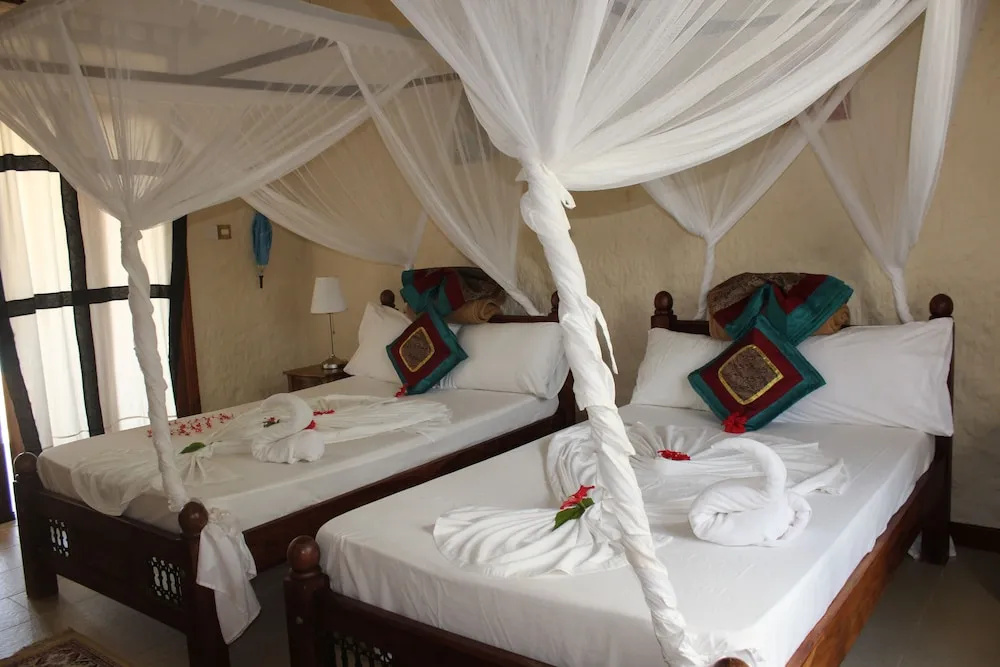 Zawadi Beach Villas - Chambres